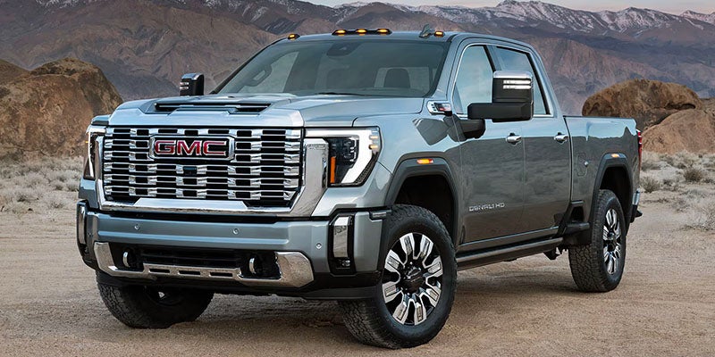 Grey 2025 GMC Sierra 2500 HD parked near mountains