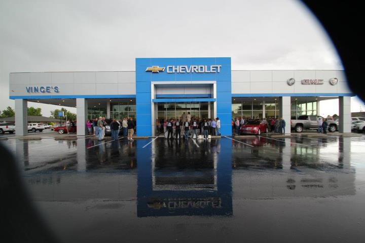 Vince's GM storefront with team members outside